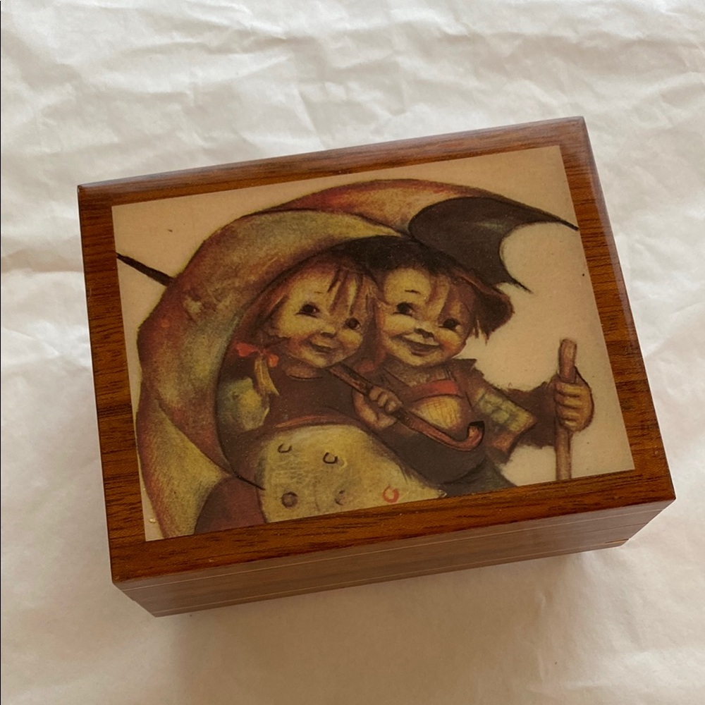 Vintage Wooden Keepsake Box with Hummels on lid.  Like new, works.